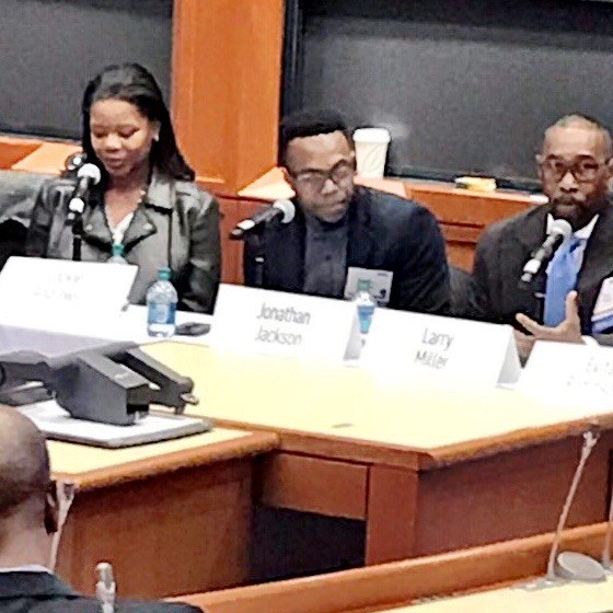 Lockie Andrews speaking on a panel at the Harvard African-American Alumni Conference