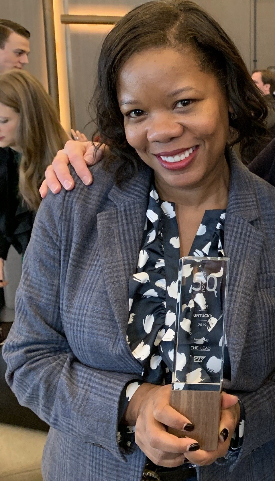 Lockie Andrews accepting The Foremost 50 Icon Award on behalf of UNTUCKit, 2019