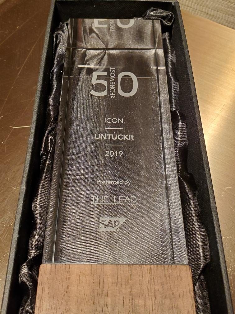 The Foremost 50 Icon Award trophy: UNTUCKit, 2019, presented by The Lead